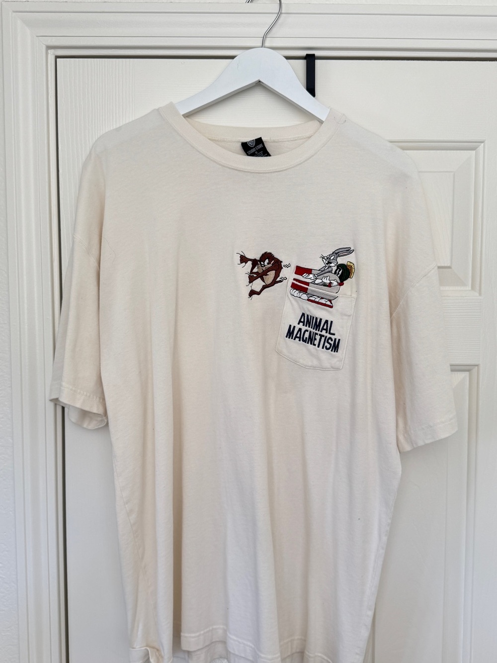 Warner Bros. Cream Looney Tunes 'Animal Magnetism' Pocket Tee